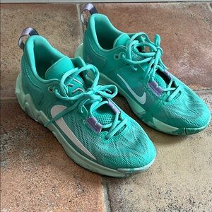 Nike Giannis Immortality 2 basketball shoes in light green and white